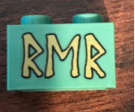 Brick 1 x 2 with Gold Runes 'RMR' Pattern (Sticker) - Set 79018