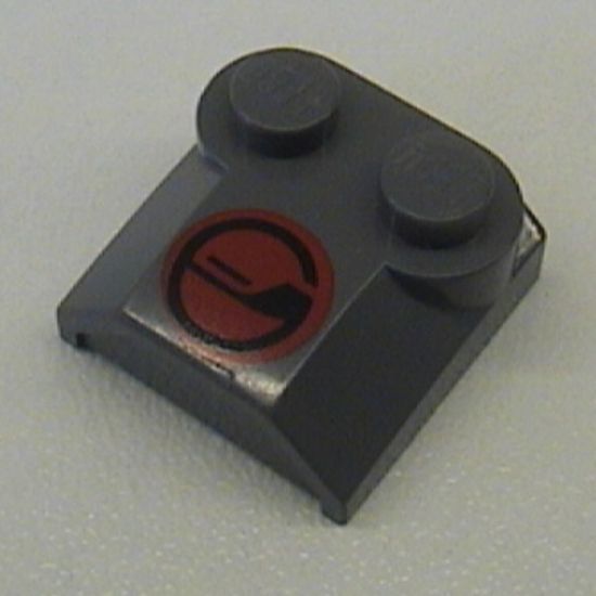 Slope, Curved 2 x 2 x 2/3 with Two Studs and Curved Sides, Lip End with Red/Black Circle Pattern