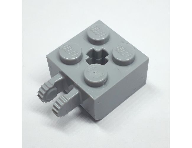 Hinge Brick 2 x 2 Locking with 2 Fingers Vertical and Axle Hole, 9 Teeth
