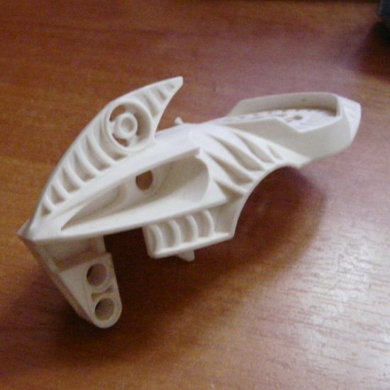 Bionicle Visorak Head with 7 Pin Holes and Axle Hole (Suukorak)