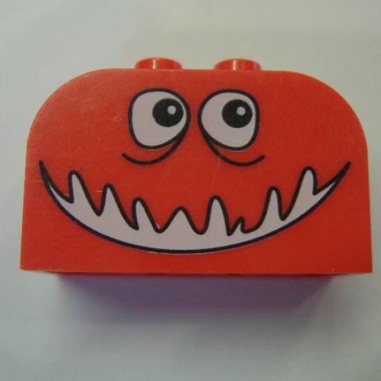 Slope, Curved 4 x 2 x 2 Double with Four Studs with Monster Face Open Smile Pattern