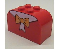 Slope, Curved 4 x 2 x 2 Double with Four Studs with Orange Bow Pattern
