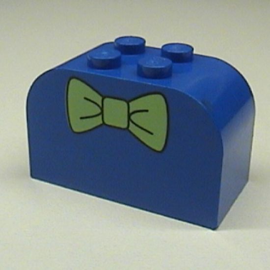 Slope, Curved 4 x 2 x 2 Double with Four Studs with Green Bow Tie Pattern