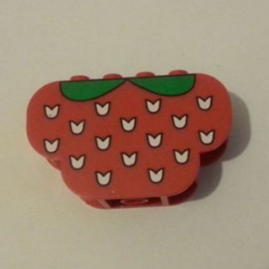 Slope, Curved 6 x 2 x 3 Triple with Eight Studs with White Flecks and Green Leaves (Strawberry) Pattern
