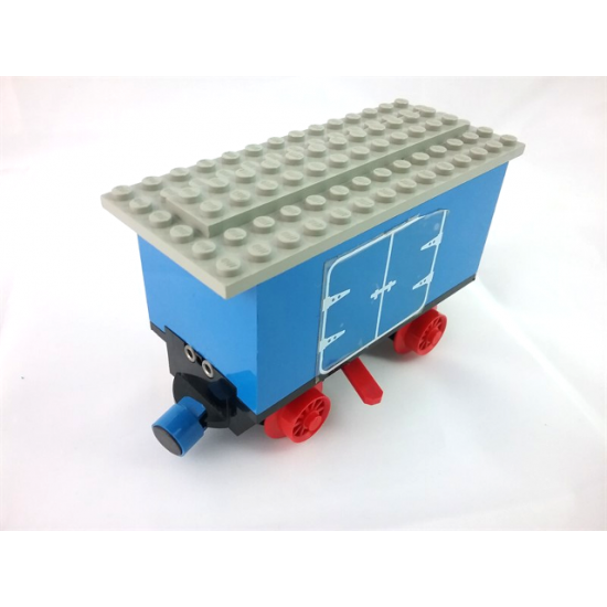 Train Battery Box Car with Three Contact Holes, Red Switch Lever, Blue and Red Magnets, Red Wheels, and Light Gray Roof with Hinged Doors Pattern on Both Sides (Stickers) - Set 7720