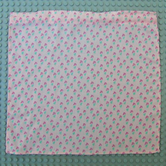 Scala Cloth Shower Curtain with Repeating Flowers Pattern