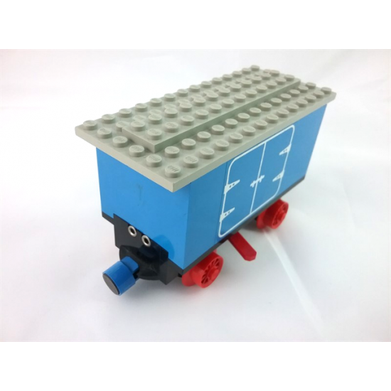 Train Battery Box Car with Two Contact Holes, Red Switch Lever, Blue and Red Magnets, Red Wheels, and Light Gray Roof with Hinged Doors Pattern on Both Sides (Stickers) - Set 7720