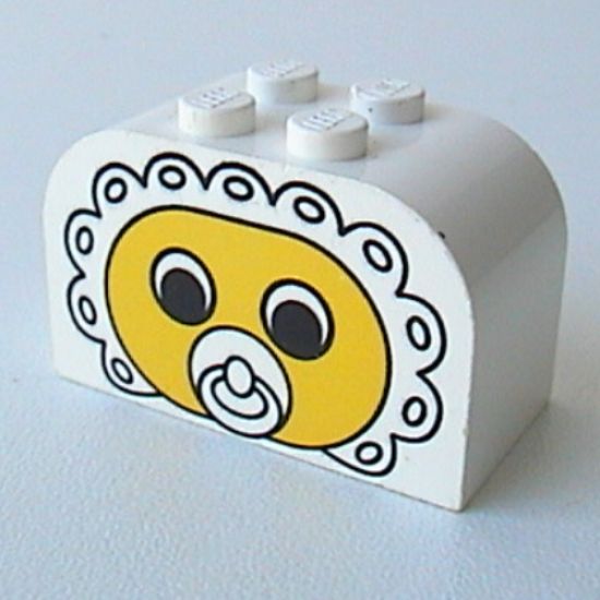 Slope, Curved 4 x 2 x 2 Double with Four Studs with Baby Face Pacifier Pattern