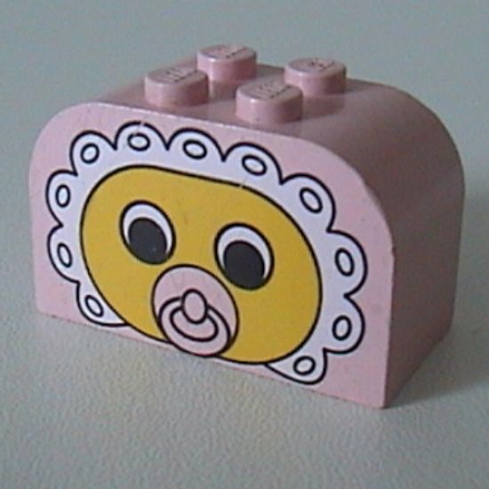 Slope, Curved 4 x 2 x 2 Double with Four Studs with Baby Face Pacifier Pattern