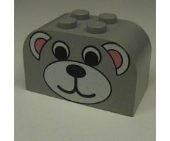 Slope, Curved 4 x 2 x 2 Double with Four Studs with Bear Face Pattern