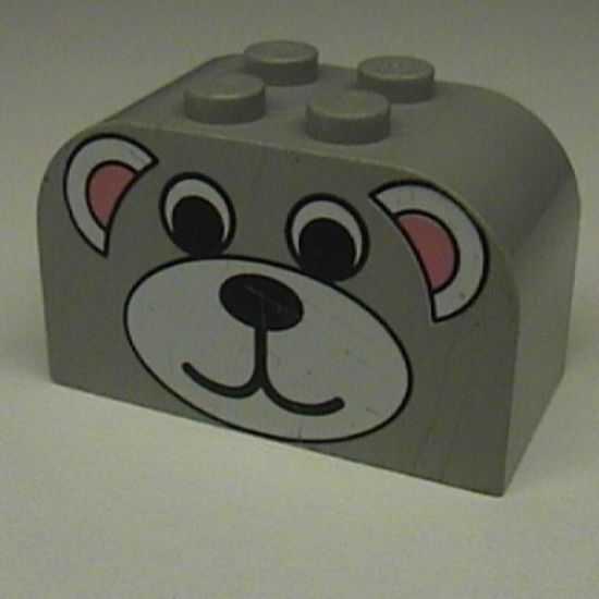Slope, Curved 4 x 2 x 2 Double with Four Studs with Bear Face Pattern