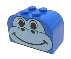 Slope, Curved 4 x 2 x 2 Double with Four Studs with Animal (Dinosaur / Gorilla) Face Pattern