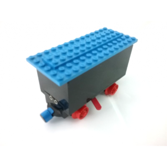 Train Battery Box Car with Two Contact Holes, Red Switch Lever, Blue and Red Magnets, Red Wheels, and Blue Roof