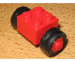 Wheel & Tire Assembly Brick, Modified 2 x 2 with Wheels Red for Dually Tire, with Black Tires Smooth Small Dually (3137c02 / 7b)