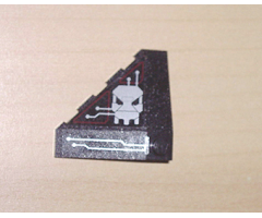 Wedge 4 x 4 (Slope 18 Corner) with Silver and Dark Red Circuitry and Skull Pattern (Stickers) - Set 7702