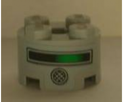 Brick, Round 2 x 2 with Axle Hole with Black and Green Line and Round Speaker Pattern (Sticker) - Set 4981