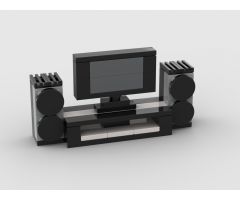 TV with desk and speakers