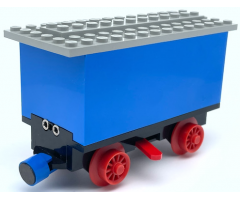 Train Battery Box Car with Three Contact Holes, Red Switch Lever, Blue and Red Magnets, Red Wheels, and Light Gray Roof