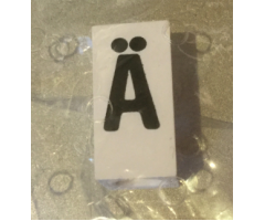 Tile, Modified 1 x 2 x 5/6 with Stud Hole in End and Black 'Ä' Upper Case Pattern