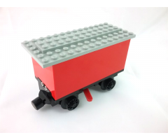 Train Battery Box Car with Three Contact Holes, Red Switch Lever, Black Magnets, Black Wheels, and Light Gray Roof